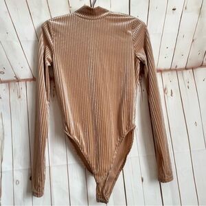 Forever 21 Long-Sleeve Velvet Ribbed One-Piece Bodysuit in Tan